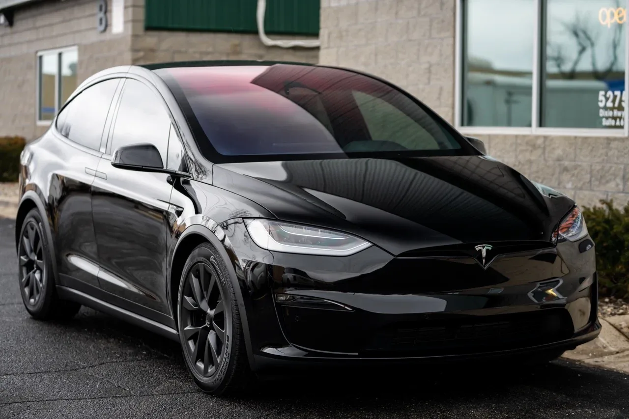 Black Tesla Model X, front three-quarter view