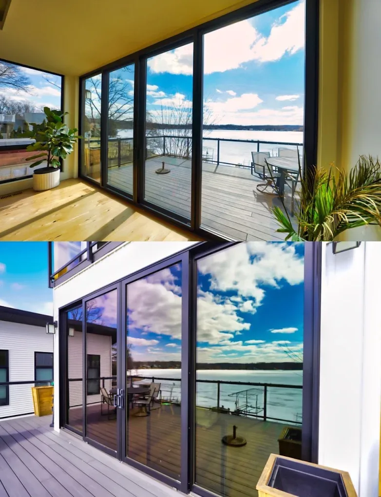Two-storey lake house windows with heat-control film, from inside