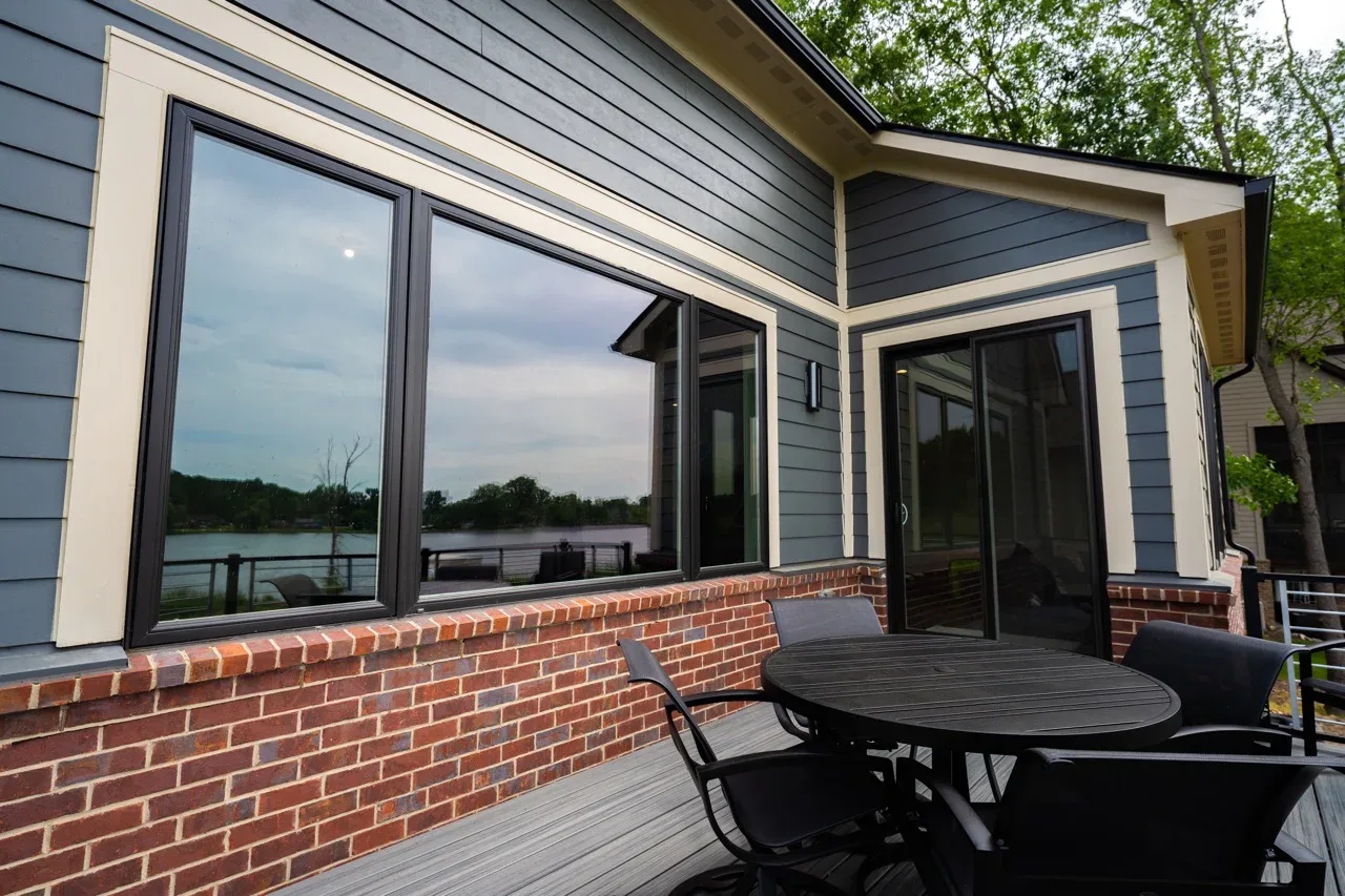 House deck with dark tinted windows