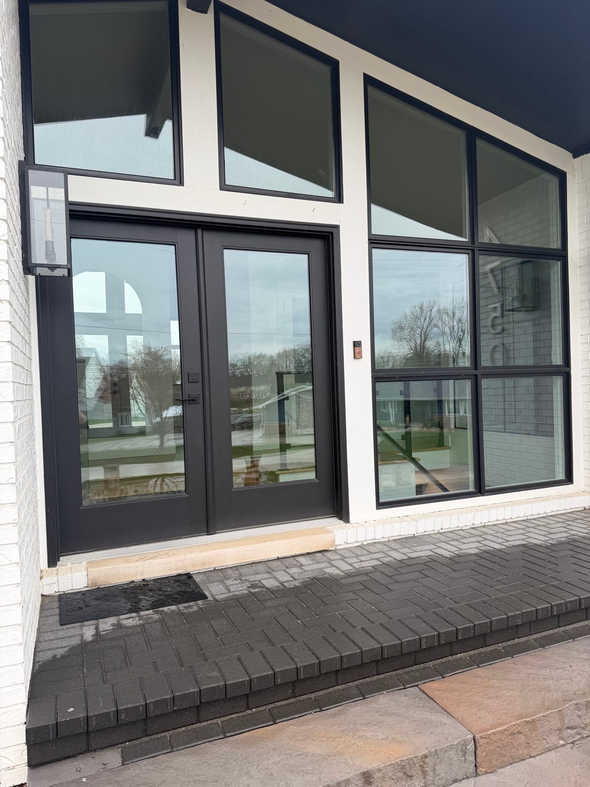 Black french doors with tinted glass