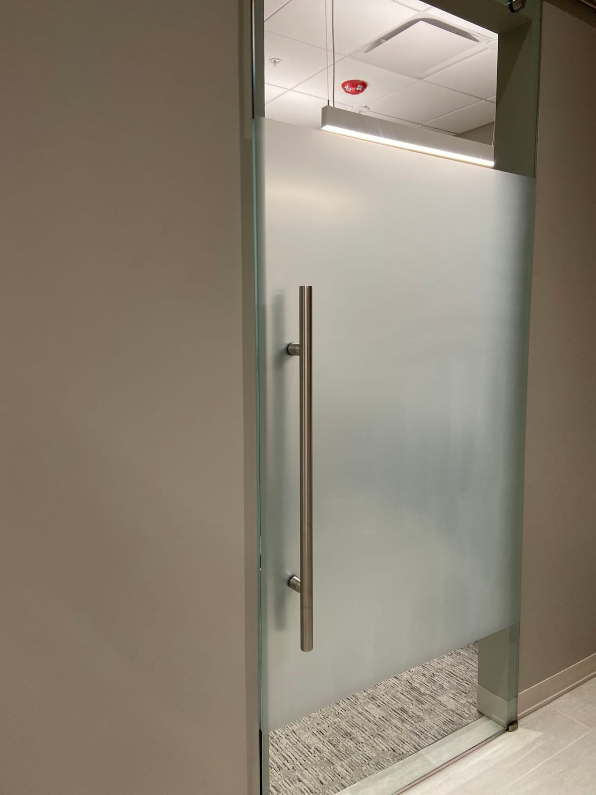 Glass door with full frosted privacy film