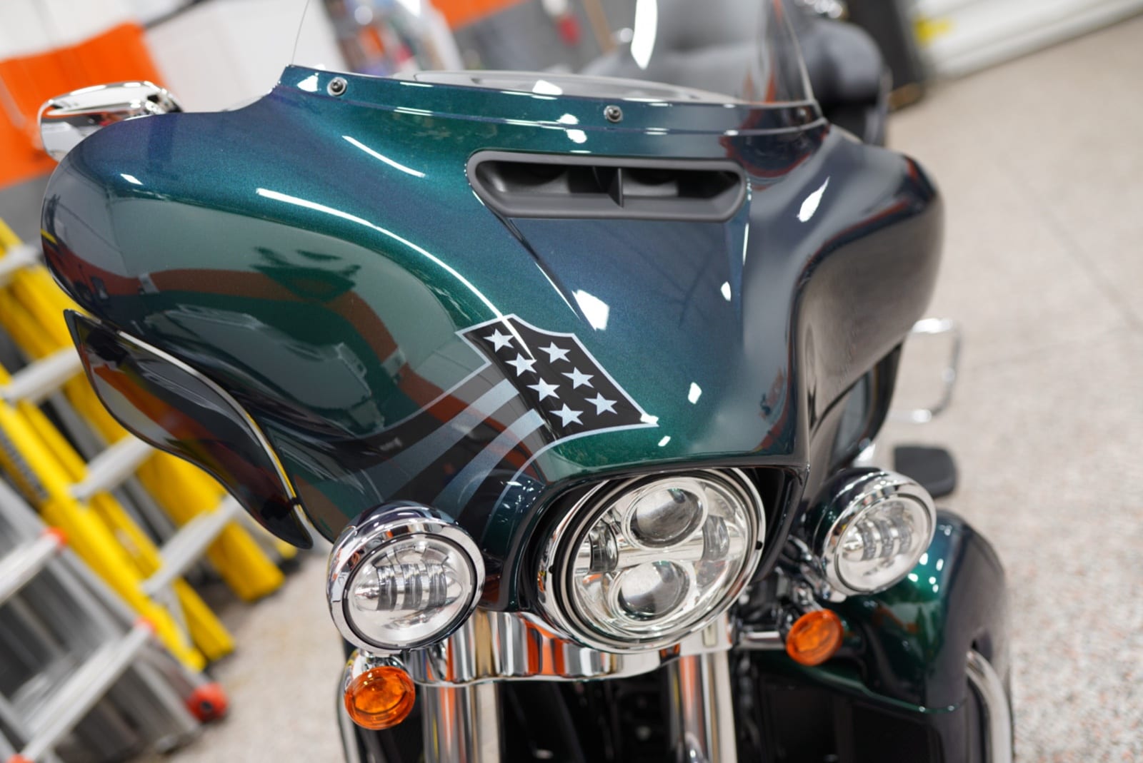 Emerald green Harley-Davidson with protective film on the fairing