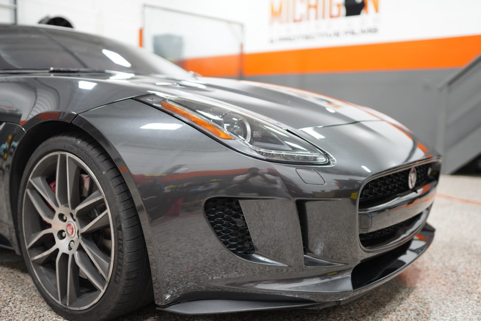 Grey Jaguar F-Type with front-end paint protection film