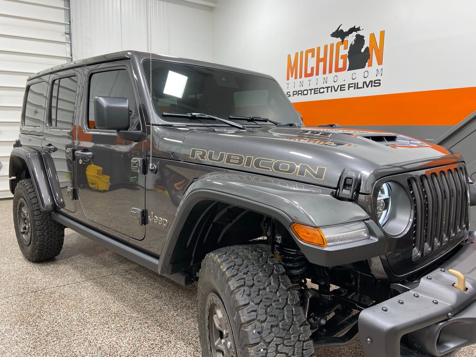 Grey Jeep Wrangler tinted in the shop