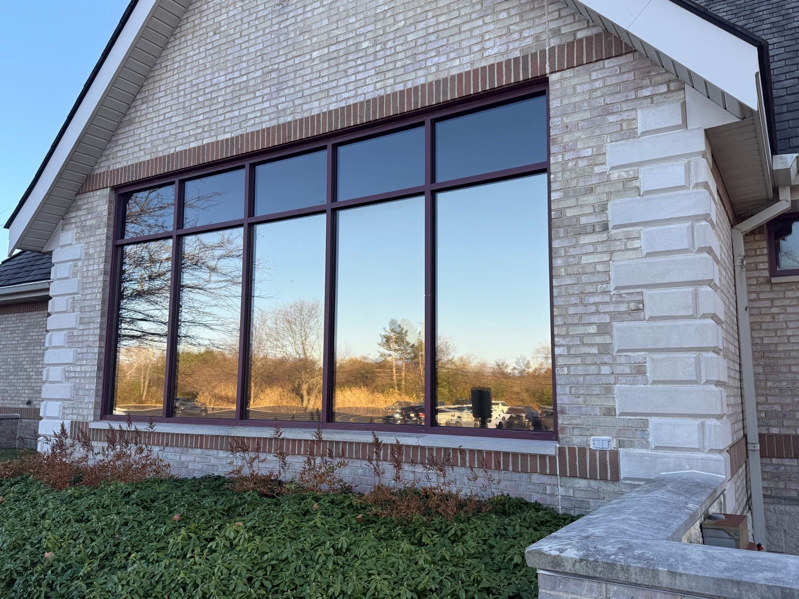 Office building corner with reflective window film